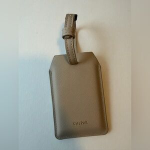 EUC Calpak Charging Luggage Tag